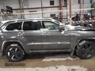 2015 Jeep Grand Cherokee Laredo with VIN 1C4RJFAGXFC752489, listed as a IAAI auction lot 41382389 with 147,892 mi miles. Bid and sale history available at carsss.com. Image 14.