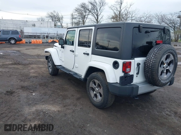2017 Jeep Wrangler Unlimited Sahara z VIN 1C4BJWEG2HL695672, wystawiony jako IAAI lot #42008396 z przebiegiem 56 028 mil mil oraz . Historia ofert i sprzedaży dostępna na DreamBid. Obrazek 3.