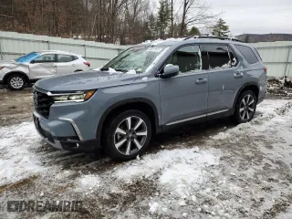 2023 Honda Pilot Elite with VIN 5FNYG1H83PB041216, listed as a Copart auction lot 84077974 with 21,257 mi miles and Salvage Title. Bid and sale history available at carsss.com. Image 1.
