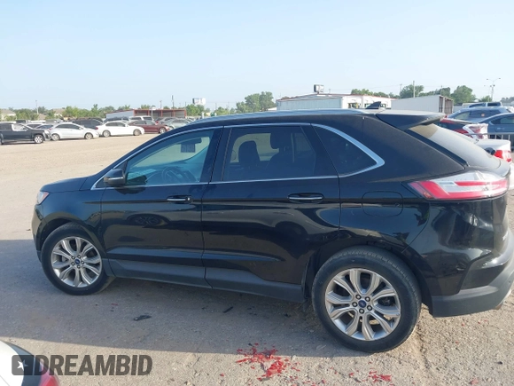 2020 Ford Edge Titanium with VIN 2FMPK3K94LBB37706, listed as a IAAI auction lot 42524373 with 77,849 mi miles and . Bid and sale history available at DreamBid. Image 14.