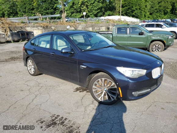 2012 BMW 5 Series Gran Turismo 550i xDrive with VIN WBASP4C54CC899853, listed as a Copart auction lot 62847714 with 141,034 mi miles and Salvage Title. Bid and sale history available at carsss.com. Image 4.