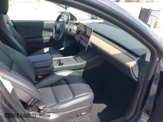 2021 Tesla Model Y Performance with VIN 5YJYGDEF7MF273897, listed as a IAAI auction lot 41925881 with 29,345 mi miles. Bid and sale history available at carsss.com. Image 5.