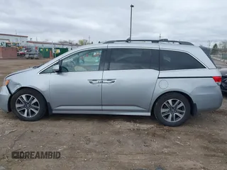 2016 Honda Odyssey Touring Elite with VIN 5FNRL5H99GB107896, listed as a IAAI auction lot 42040395 with 162,120 mi miles and . Bid and sale history available at carsss.com. Image 14.