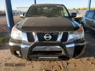 2012 Nissan Titan SV with VIN 1N6BA0ED5CN302776, listed as a Copart auction lot 55096625 with 128,484 mi miles and Salvage title. Bid and sale history available at DreamBid. Image 5.
