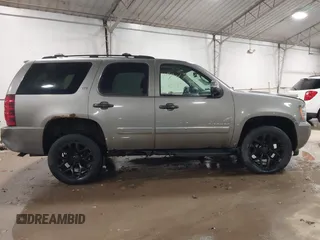2009 Chevrolet Tahoe LTZ with VIN 1GNFK33049R143390, listed as a IAAI auction lot 41747041 with 209,492 mi miles and . Bid and sale history available at DreamBid. Image 13.