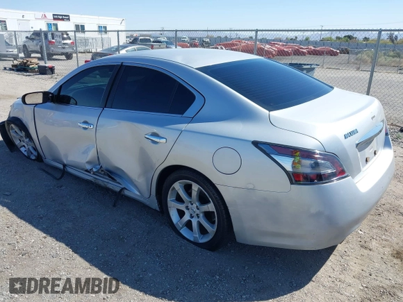 2014 Nissan Maxima S z VIN 1N4AA5APXEC450907, wystawiony jako IAAI lot #41998184 z przebiegiem 186 314 mil mil oraz . Historia ofert i sprzedaży dostępna na DreamBid. Obrazek 3.