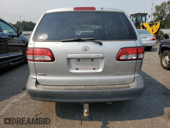 2001 Toyota Sienna CE with VIN 4T3ZF19C11U412899, listed as a Copart auction lot 70303244 with 190,025 mi miles and Salvage Title. Bid and sale history available at DreamBid. Image 6.