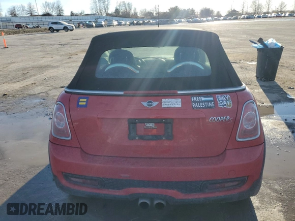 2015 MINI Convertible S с VIN WMWZP3C57FT299177, выставлен на аукционе Copart как лот 43277825 с пробегом 79 454 миль миль и Списание • Salvage title. История ставок и продаж доступна на DreamBid. Изображение 6.