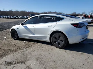 2020 Tesla Model 3 Long Range z VIN 5YJ3E1EB0LF628130, wystawiony jako Copart lot #50706955 z przebiegiem 67 384 mil mil oraz Szkoda całkowita • Salvage title. Historia ofert i sprzedaży dostępna na DreamBid. Obrazek 2.