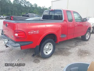 1997 Ford F-150 with VIN 1FTDX08W2VKC17809, listed as a IAAI auction lot 42541525 with 143,963 mi miles and . Bid and sale history available at DreamBid. Image 4.