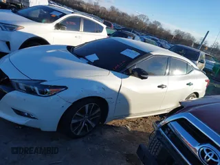 2018 Nissan Maxima SV with VIN 1N4AA6AP7JC372246, listed as a IAAI auction lot 41387139 with 104,686 mi miles and . Bid and sale history available at DreamBid. Image 14.