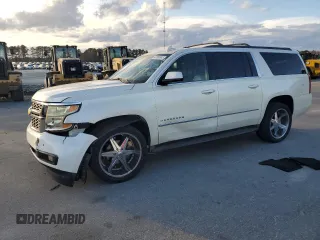 2015 Chevrolet Suburban LT with VIN 1GNSKJKC2FR638780, listed as a Copart auction lot 47360345 with 156,884 mi miles and Salvage Title. Bid and sale history available at carsss.com. Image 1.