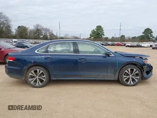 2021 Volkswagen Passat SE z VIN 1VWSA7A37MC009030, wystawiony jako IAAI lot #41172489 z przebiegiem 70 100 mil mil oraz . Historia ofert i sprzedaży dostępna na DreamBid. Obrazek 14.