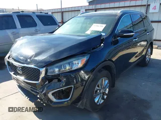 2018 Kia Sorento LX with VIN 5XYPG4A39JG342455, listed as a IAAI auction lot 41366386 with 131,033 mi miles. Bid and sale history available at carsss.com. Image 2.