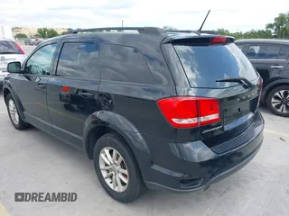 2015 Dodge Journey SXT with VIN 3C4PDCBG5FT604847, listed as a IAAI auction lot 42108853 with 164,679 mi miles. Bid and sale history available at carsss.com. Image 3.