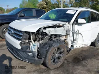 2018 Volkswagen Atlas SE with VIN 1V2CR2CAXJC548220, listed as a IAAI auction lot 41983957 with 118,371 mi miles and . Bid and sale history available at DreamBid. Image 6.