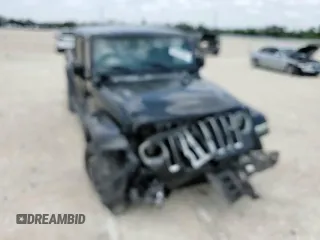 2020 Jeep Gladiator Overland with VIN 1C6HJTFG9LL217966, listed as a Copart auction lot 59424545 with 61,407 mi miles and Salvage title. Bid and sale history available at DreamBid. Image 13.