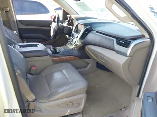 2015 Chevrolet Tahoe LTZ with VIN 1GNSCCKCXFR287609, listed as a IAAI auction lot 41688936 with 112,678 mi miles. Bid and sale history available at carsss.com. Image 5.