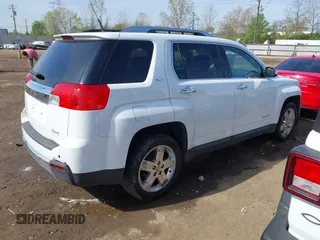 2011 GMC Terrain SLT-2 z VIN 2CTALWEC1B6461112, wystawiony jako IAAI lot #42091529 z przebiegiem 142 224 mil mil oraz . Historia ofert i sprzedaży dostępna na DreamBid. Obrazek 4.