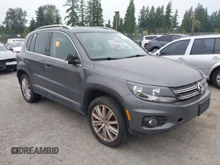2015 Volkswagen Tiguan R-Line z VIN WVGBV7AX9FW506457, wystawiony jako IAAI lot #42441104 z przebiegiem 91 258 mil mil oraz . Historia ofert i sprzedaży dostępna na DreamBid. Obrazek 1.