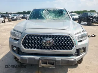 2019 Toyota Tacoma SR z VIN 5TFCZ5AN6KX211952, wystawiony jako Copart lot #58964815 z przebiegiem 97 774 mil mil oraz Szkoda całkowita • Salvage title. Historia ofert i sprzedaży dostępna na DreamBid. Obrazek 5.