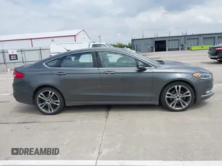 2017 Ford Fusion Titanium with VIN 3FA6P0D93HR261526, listed as a IAAI auction lot 42277350 with 117,388 mi miles and . Bid and sale history available at DreamBid. Image 13.
