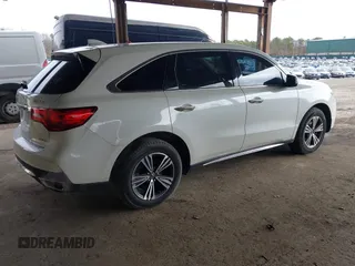 2017 Acura MDX with VIN 5FRYD4H39HB016948, listed as a IAAI auction lot 41886584 with 100,853 mi miles. Bid and sale history available at carsss.com. Image 4.
