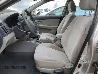 2009 Kia Spectra EX with VIN KNAFE221195655309, listed as a Copart auction lot 46620985 with 105,607 mi miles and Salvage Title. Bid and sale history available at DreamBid. Image 7.