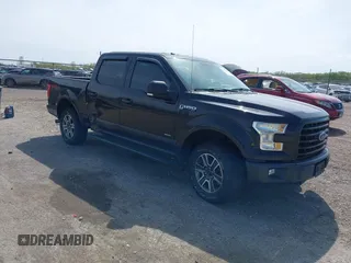 2015 Ford F-150 XLT with VIN 1FTEW1EG3FKE16010, listed as a IAAI auction lot 42107938 with 242,625 mi miles and . Bid and sale history available at DreamBid. Image 1.