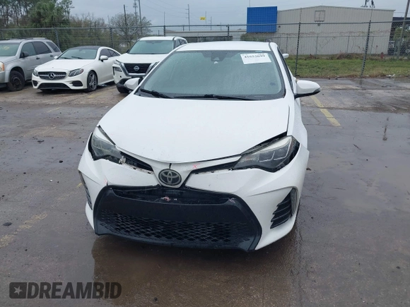 2017 Toyota Corolla L z VIN 2T1BURHE8HC764049, wystawiony jako IAAI lot #41653699 z przebiegiem 401 813 mil mil oraz . Historia ofert i sprzedaży dostępna na DreamBid. Obrazek 6.