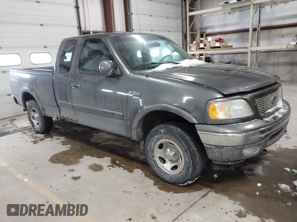 2003 Ford F-150 XL with VIN 1FTRX18W63NB69173, listed as a IAAI auction lot 41618645 with 219,506 mi miles. Bid and sale history available at carsss.com. Image 1.