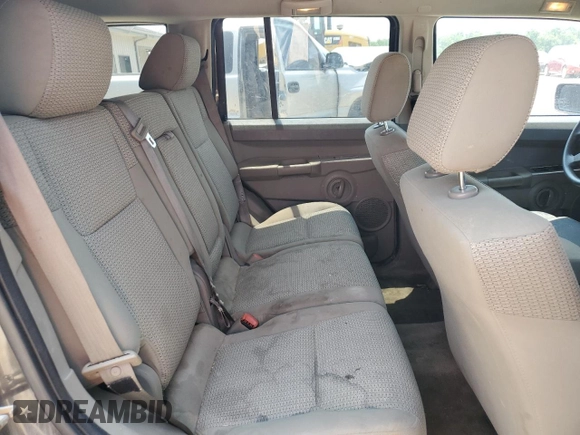 2006 Jeep Commander z VIN 1J8HG48K36C263515, wystawiony jako Copart lot #59080765 z przebiegiem 167 635 mil mil oraz Szkoda całkowita • Salvage title. Historia ofert i sprzedaży dostępna na DreamBid. Obrazek 11.