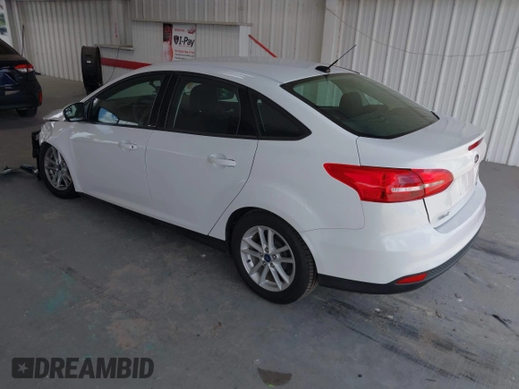 2017 Ford Focus SE with VIN 1FADP3F2XHL342823, listed as a IAAI auction lot 42496940 with 97,263 mi miles and . Bid and sale history available at DreamBid. Image 3.