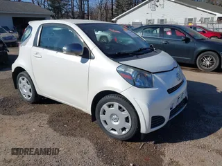 2012 Scion iQ with VIN JTNJJXB08CJ011734, listed as a IAAI auction lot 41769409 with 75,931 mi miles. Bid and sale history available at carsss.com. Image 1.