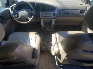2001 Toyota Sienna LE with VIN 4T3ZF13C11U390198, listed as a Copart auction lot 76785094 with 200,803 mi miles and Salvage Title. Bid and sale history available at carsss.com. Image 8.