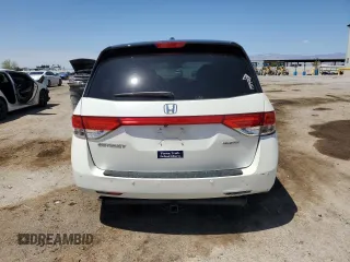 2015 Honda Odyssey Touring Elite z VIN 5FNRL5H91FB053430, wystawiony jako Copart lot #55276315 z przebiegiem 96 667 mil mil oraz Szkoda całkowita • Salvage title. Historia ofert i sprzedaży dostępna na DreamBid. Obrazek 6.
