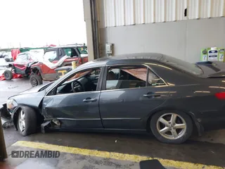 2005 Honda Accord EX with VIN JHMCM56755C007601, listed as a IAAI auction lot 41209511 with 238,715 mi miles and . Bid and sale history available at DreamBid. Image 14.