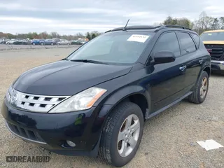 2003 Nissan Murano SL with VIN JN8AZ08T23W121885, listed as a IAAI auction lot 41954132 with 157,454 mi miles. Bid and sale history available at carsss.com. Image 2.