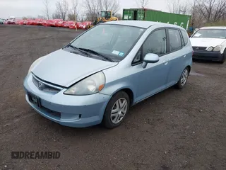 2007 Honda Fit with VIN JHMGD38417S035560, listed as a IAAI auction lot 41960233 with 130,161 mi miles. Bid and sale history available at carsss.com. Image 2.