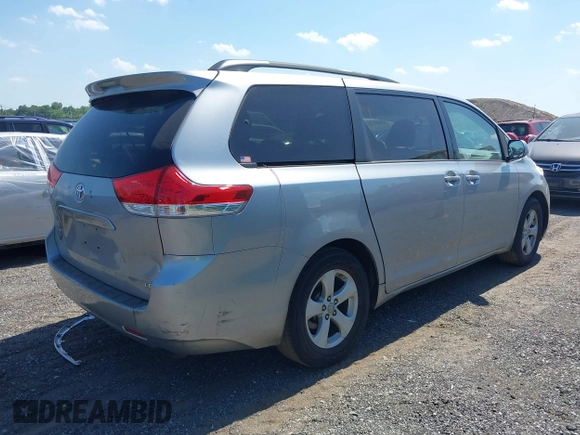 2011 Toyota Sienna LE AAS with VIN 5TDKK3DC2BS096965, listed as a IAAI auction lot 42583783 with 288,489 mi miles and . Bid and sale history available at DreamBid. Image 4.