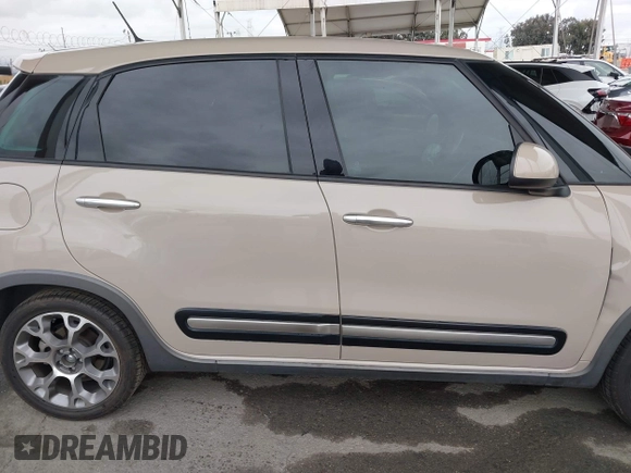 2014 FIAT 500L Trekking with VIN ZFBCFADHXEZ015287, listed as a IAAI auction lot 42063297 with 81,858 mi miles and . Bid and sale history available at DreamBid. Image 13.