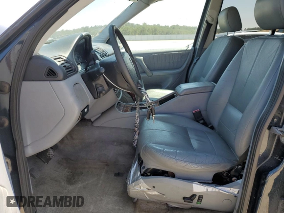 2002 Mercedes-Benz M-Class with VIN 4JGAB75E22A303060, listed as a Copart auction lot 63610284 with 192,968 mi miles and Salvage Title. Bid and sale history available at carsss.com. Image 7.