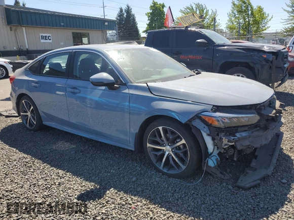 2022 Honda Civic Touring with VIN 2HGFE1F90NH319961, listed as a Copart auction lot 57799335 with 36,458 mi miles and Salvage title. Bid and sale history available at DreamBid. Image 4.