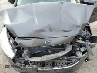 2017 Ford Focus S z VIN 1FADP3E21HL304026, wystawiony jako Copart lot #58786875 z przebiegiem 68 092 mil mil oraz Szkoda całkowita • Salvage title. Historia ofert i sprzedaży dostępna na DreamBid. Obrazek 11.
