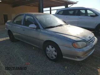 2001 Kia Sephia z VIN KNAFB121715014673, wystawiony jako Copart lot #71712174 z przebiegiem 83 277 mil mil oraz Szkody całkowita. Historia ofert i sprzedaży dostępna na DreamBid. Obrazek 4.