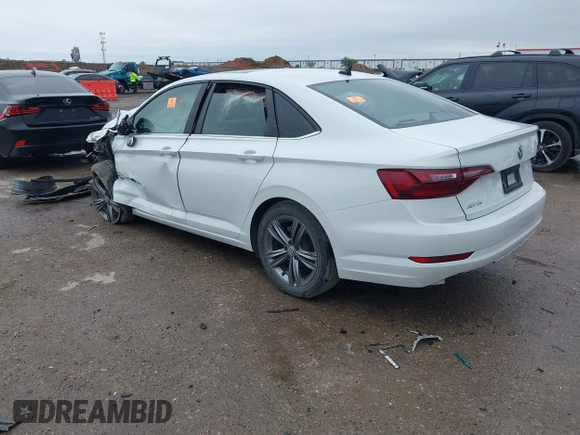 2021 Volkswagen Jetta S z VIN 3VWC57BUXMM017430, wystawiony jako IAAI lot #41947038 z przebiegiem 50 277 mil mil oraz . Historia ofert i sprzedaży dostępna na DreamBid. Obrazek 3.