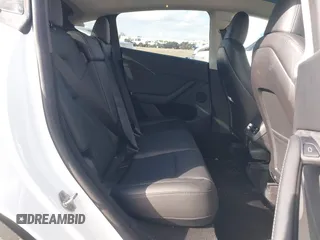 2023 Tesla Model Y Long Range z VIN 7SAYGDEE0PA128888, wystawiony jako IAAI lot #41410085 z przebiegiem 12 578 mil mil oraz . Historia ofert i sprzedaży dostępna na DreamBid. Obrazek 8.