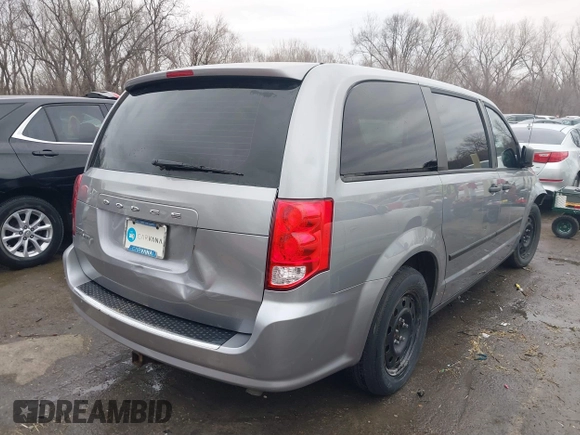 2014 Dodge Grand Caravan American Value with VIN 2C4RDGBG9ER187198, listed as a IAAI auction lot 41669334 with 204,803 mi miles and . Bid and sale history available at DreamBid. Image 4.
