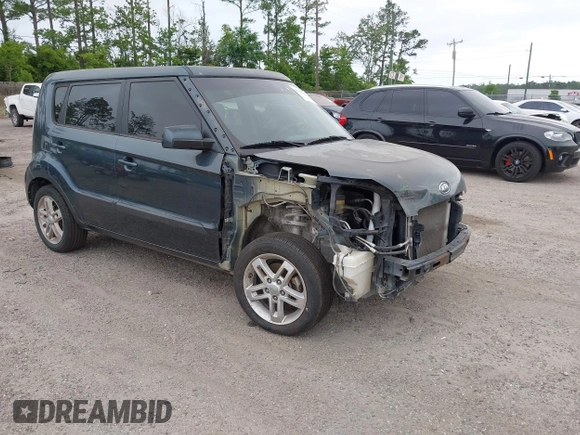 2011 Kia Soul + with VIN KNDJT2A29B7346601, listed as a IAAI auction lot 42128954 with 247,952 mi miles. Bid and sale history available at carsss.com. Image 1.