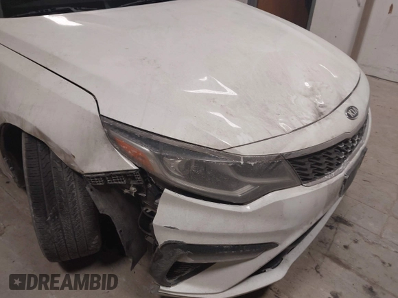 2019 Kia Optima LX with VIN 5XXGT4L39KG280666, listed as a IAAI auction lot 41436121 with 121,531 mi miles. Bid and sale history available at carsss.com. Image 6.